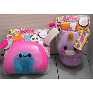 Fluffie Stuffiez collectible plush toys: a Rainbow and a Unicorn both NIB
